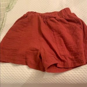 Red flowy band shorts